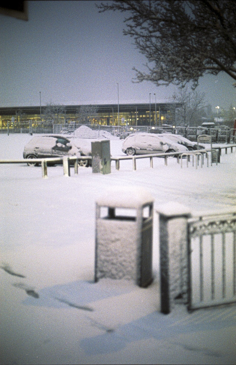 white snow covered fence during daytime