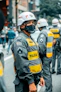 man in black and yellow jacket wearing white helmet