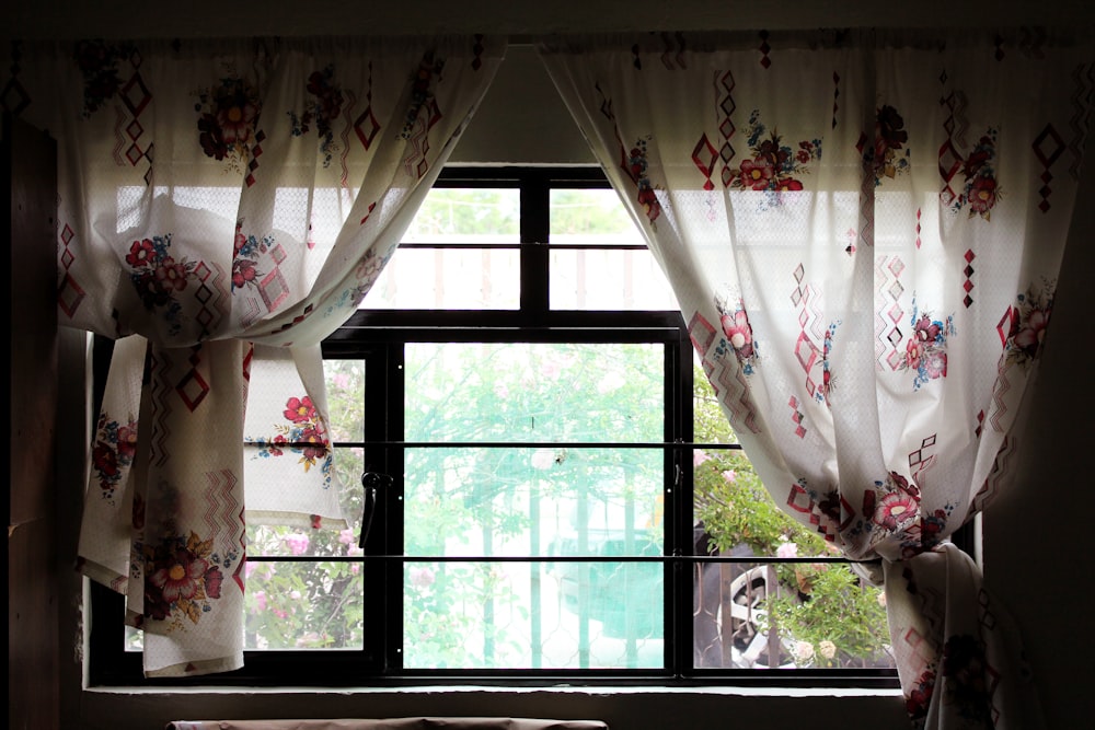white and pink floral window curtain