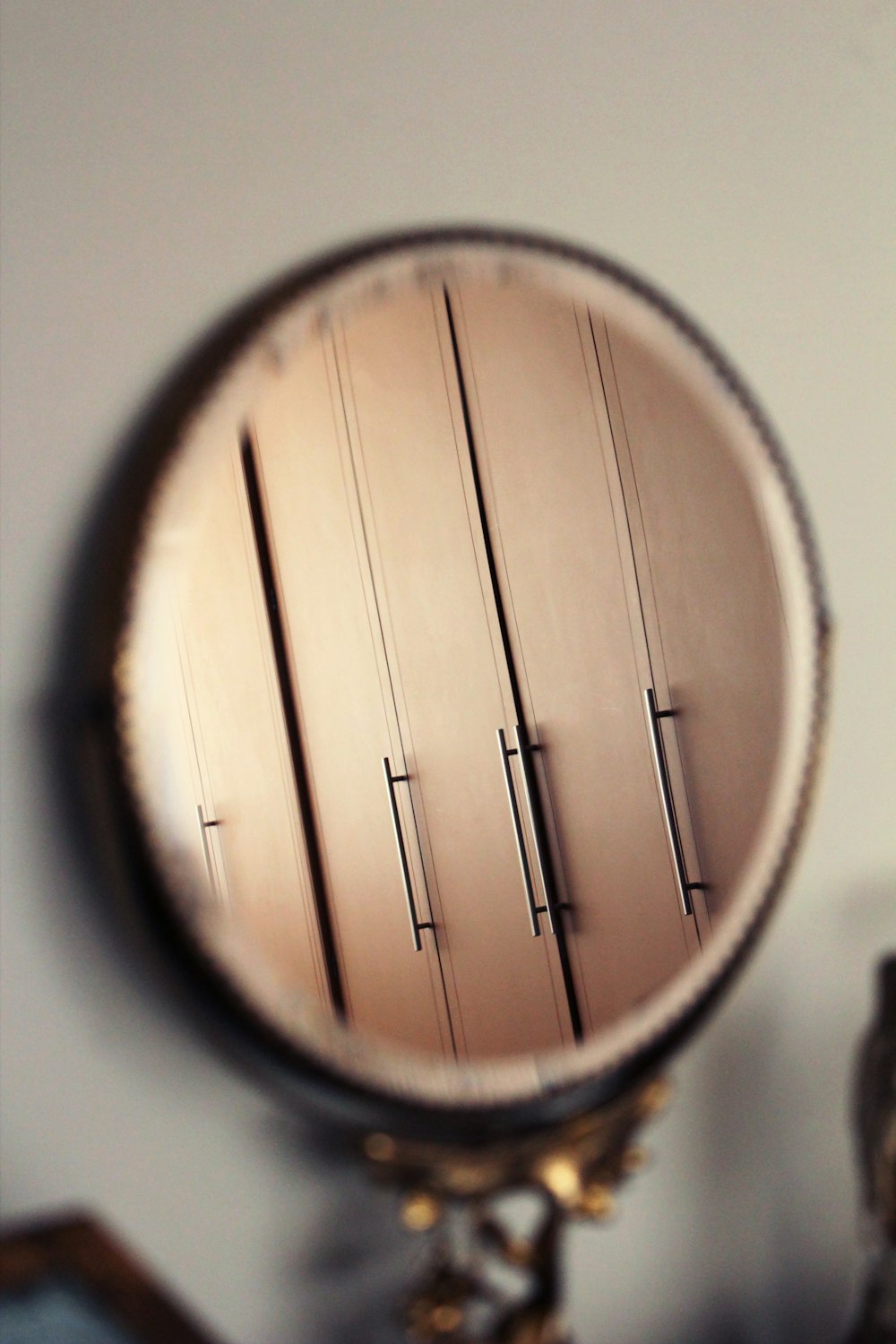 black magnifying glass on white table