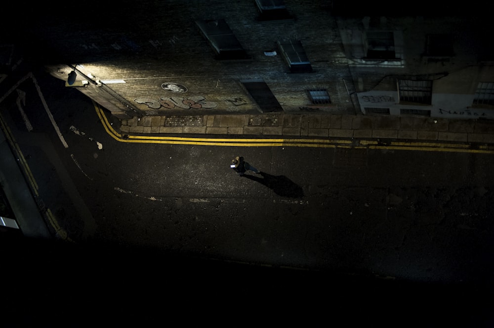 black car on road during night time