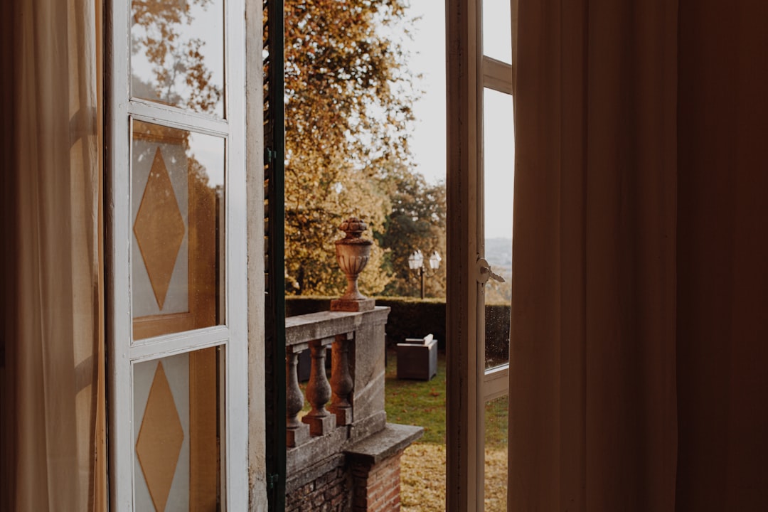 brown wooden framed glass door