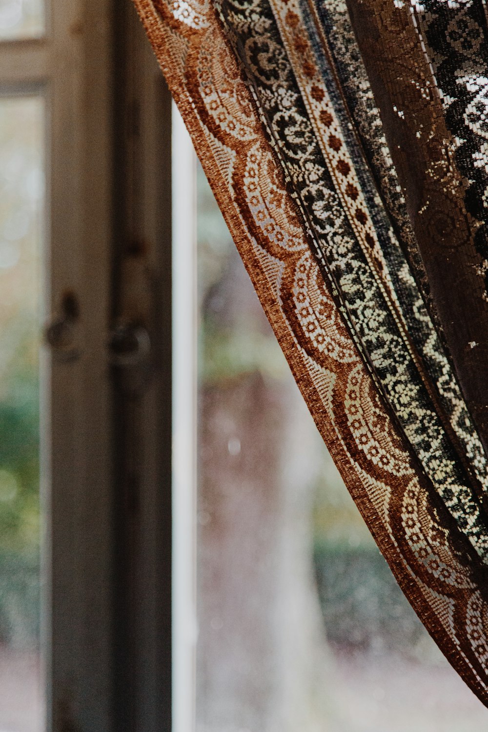 brown and black floral curtain