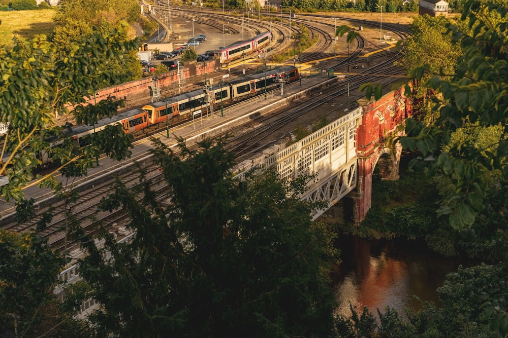 aerial view of train rail near river during daytime