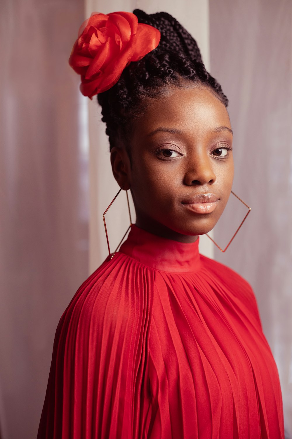 girl in red dress with red flower headband