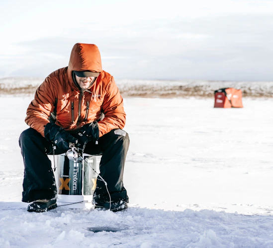 ice fishing on a Colorado reservoir in winter