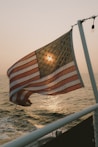 us a flag on white pole