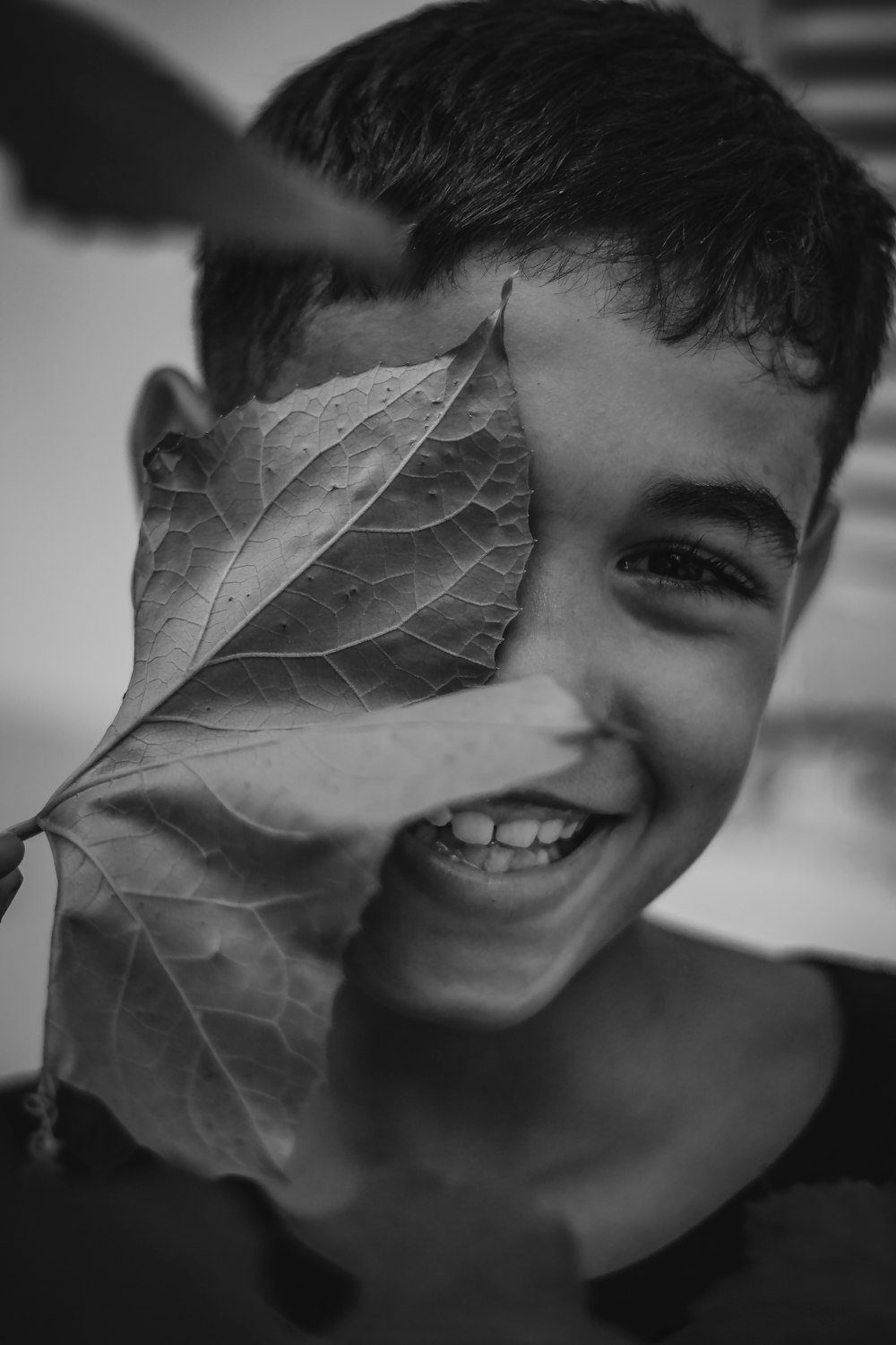 grayscale photo of smiling woman