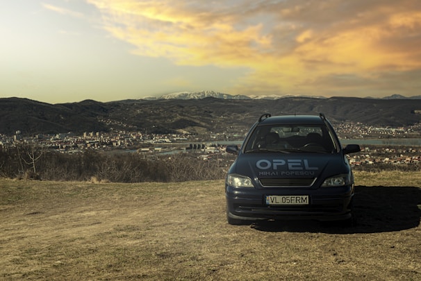 Altroz displayed on a scenic hilltop with a panoramic view of the valley below.