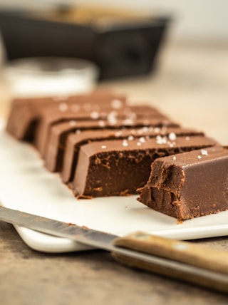 chocolate bar on white ceramic plate