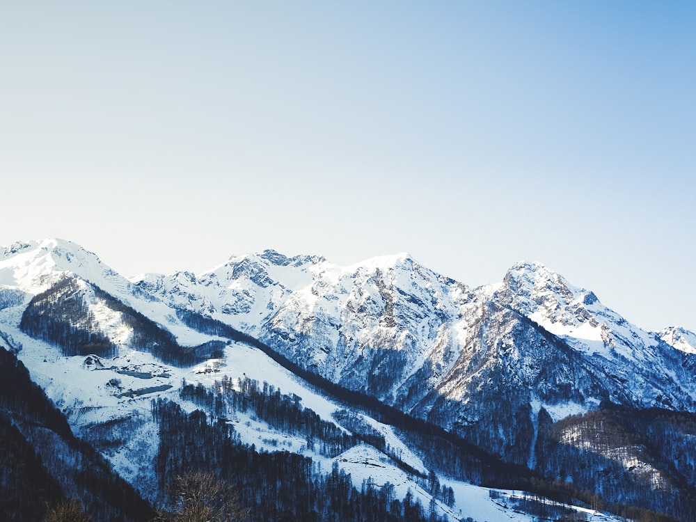 snow covered mountain during daytime