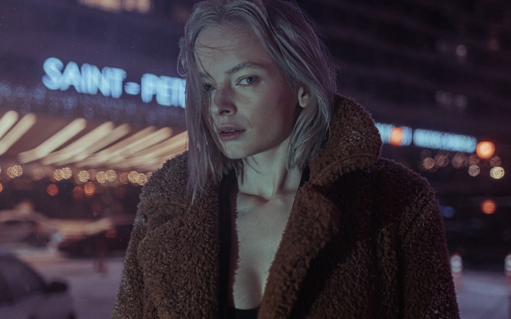 woman in brown fur coat