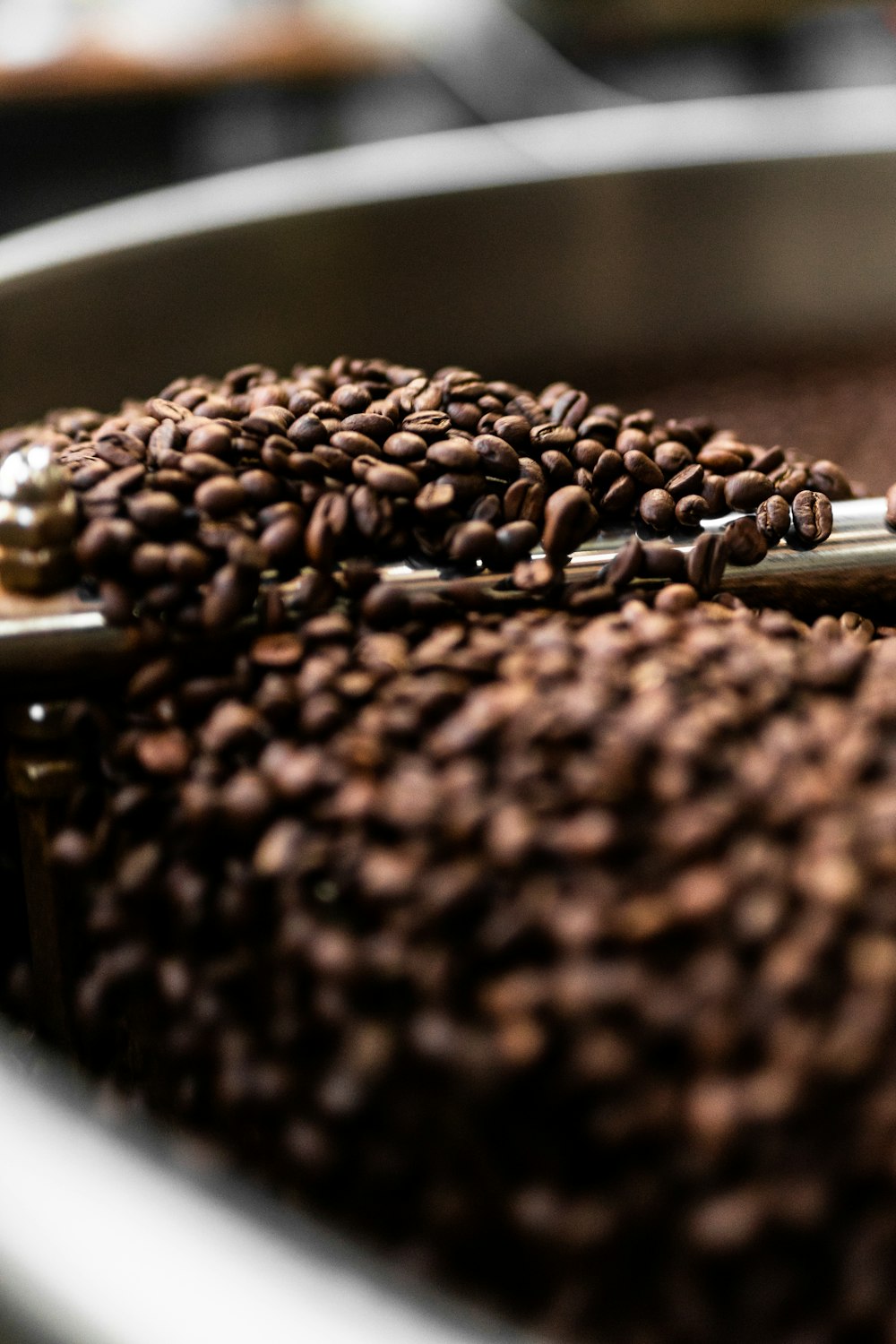 coffee beans on brown ceramic bowl