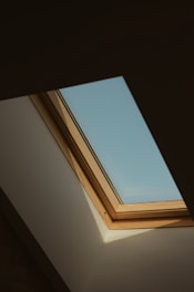 white wooden framed glass window