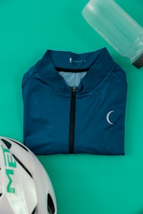 blue and white zip up jacket