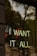 A neon sign with the text 'I WANT IT ALL' is displayed against a reflective glass surface, capturing the reflection of trees and buildings in the background. The sign emits a bright, white light, creating a stark contrast with the darker surroundings.