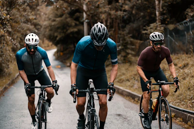 2 men riding on bicycle