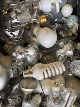 An assortment of light fixtures and bulbs.