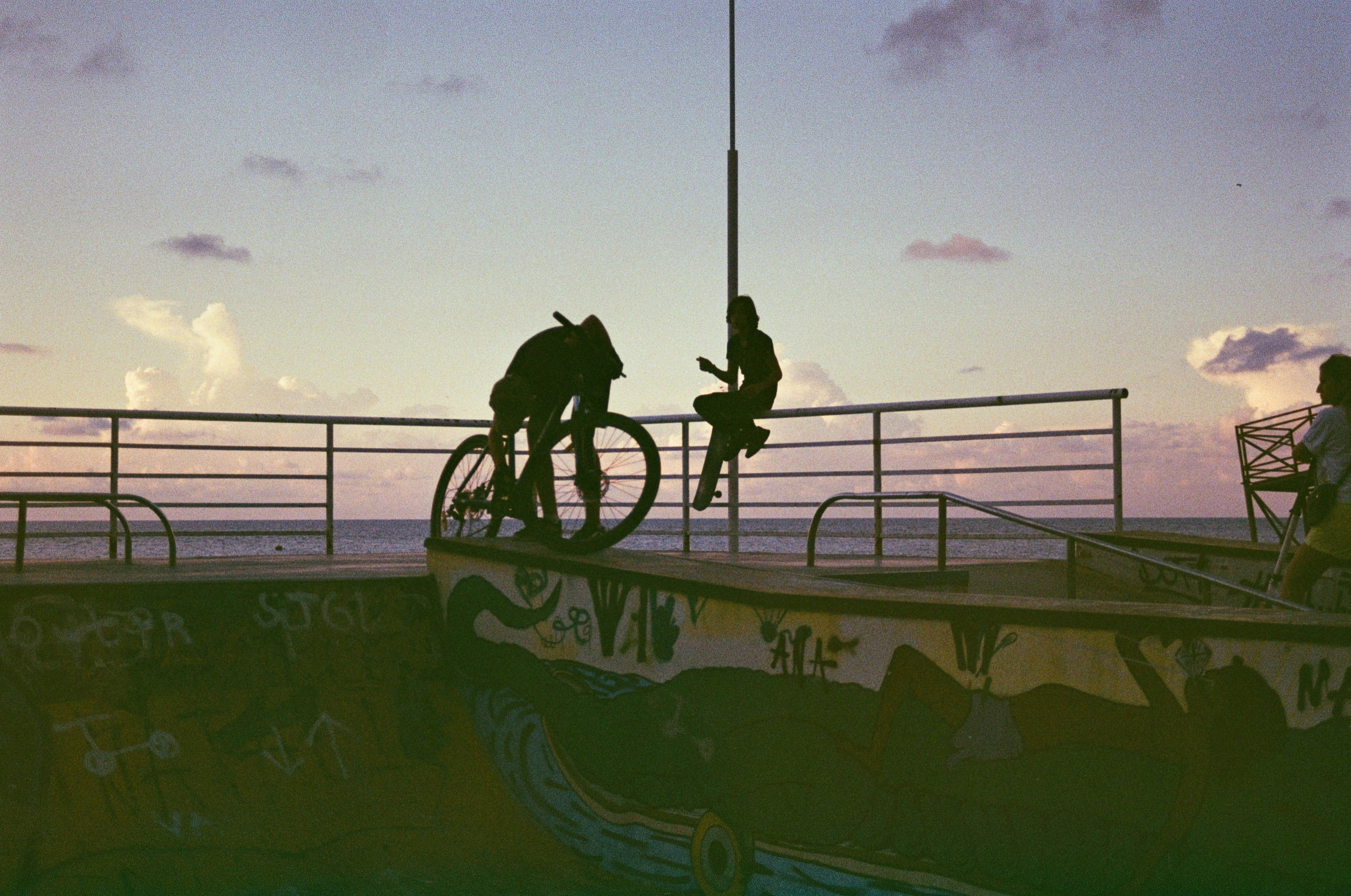 2 men riding on green boat during daytime