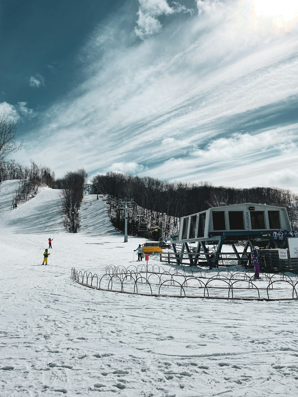 people walking on snow covered ground during daytime