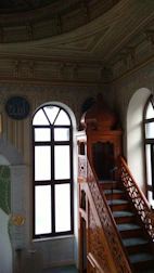 A beautifully crafted traditional Saudi majlis with intricate wooden details.