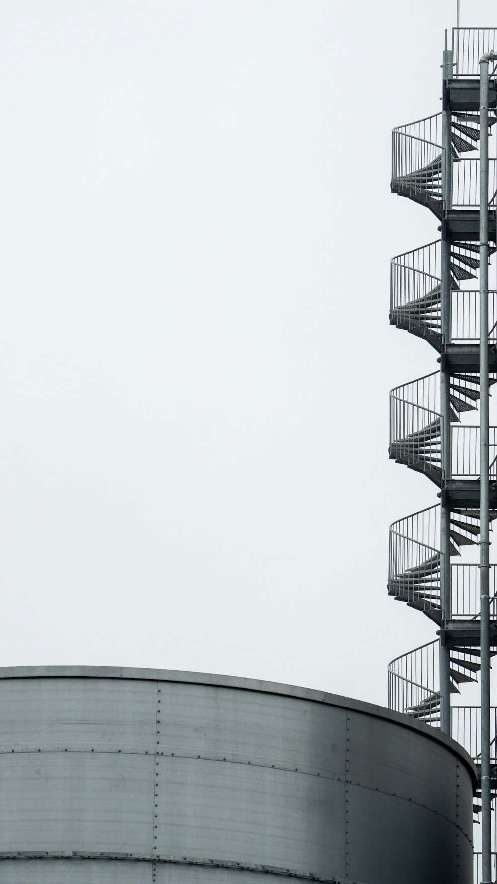 white spiral stairs with white background