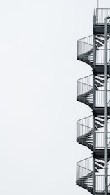 white spiral stairs with white background