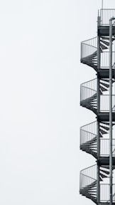 white spiral stairs with white background