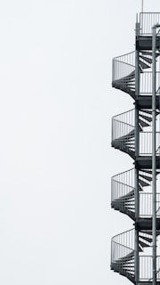white spiral stairs with white background