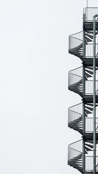 white spiral stairs with white background