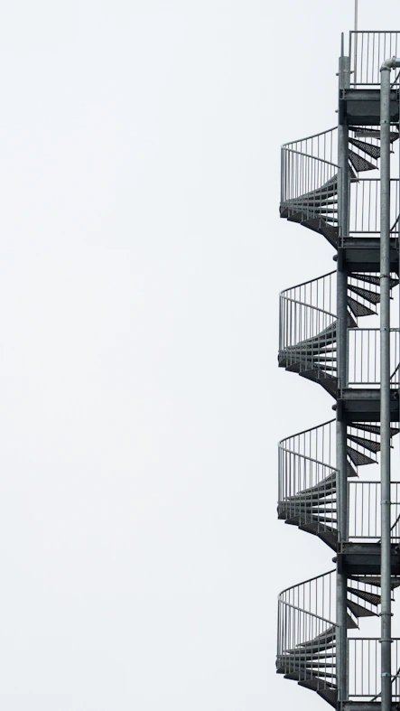 white spiral stairs with white background