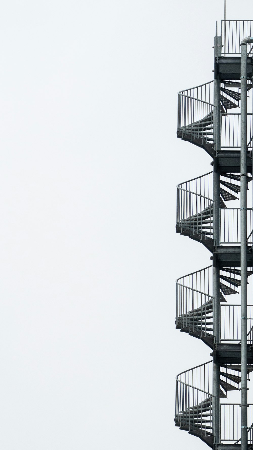 white spiral stairs with white background