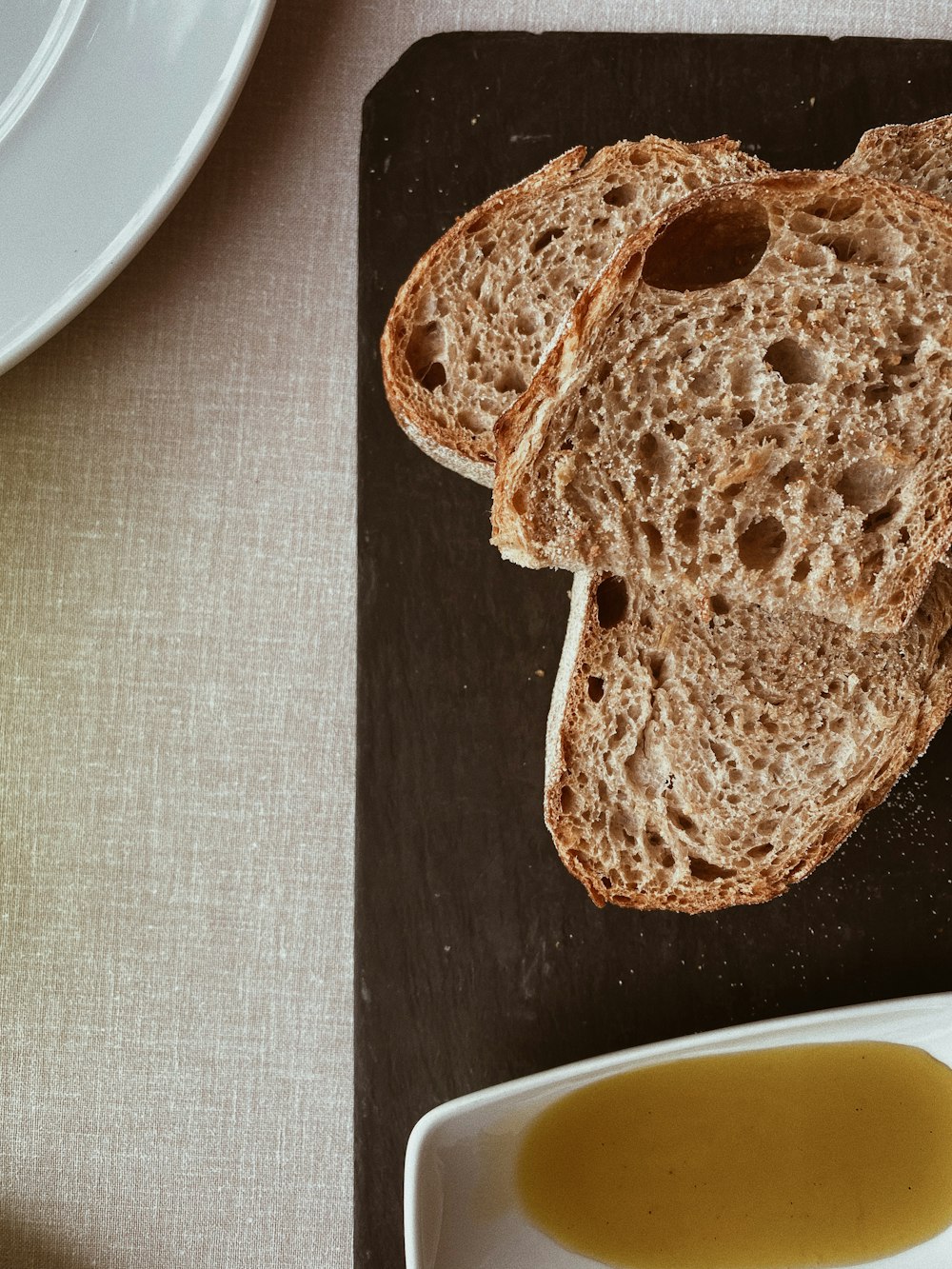 bread on white ceramic plate