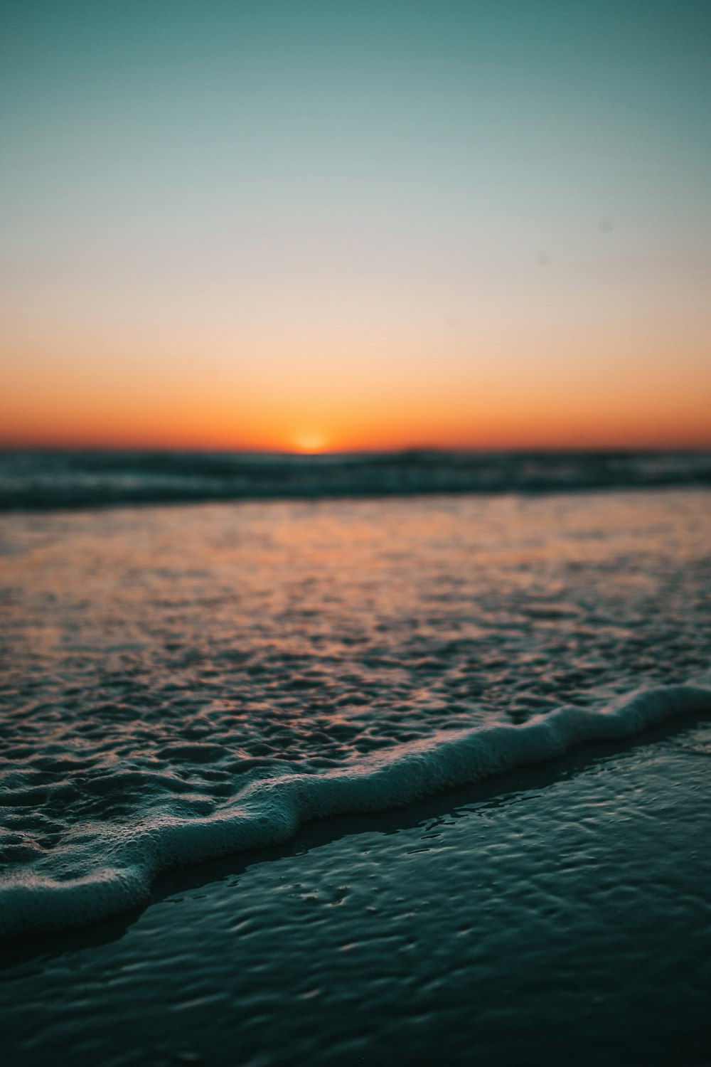 water wave during golden hour