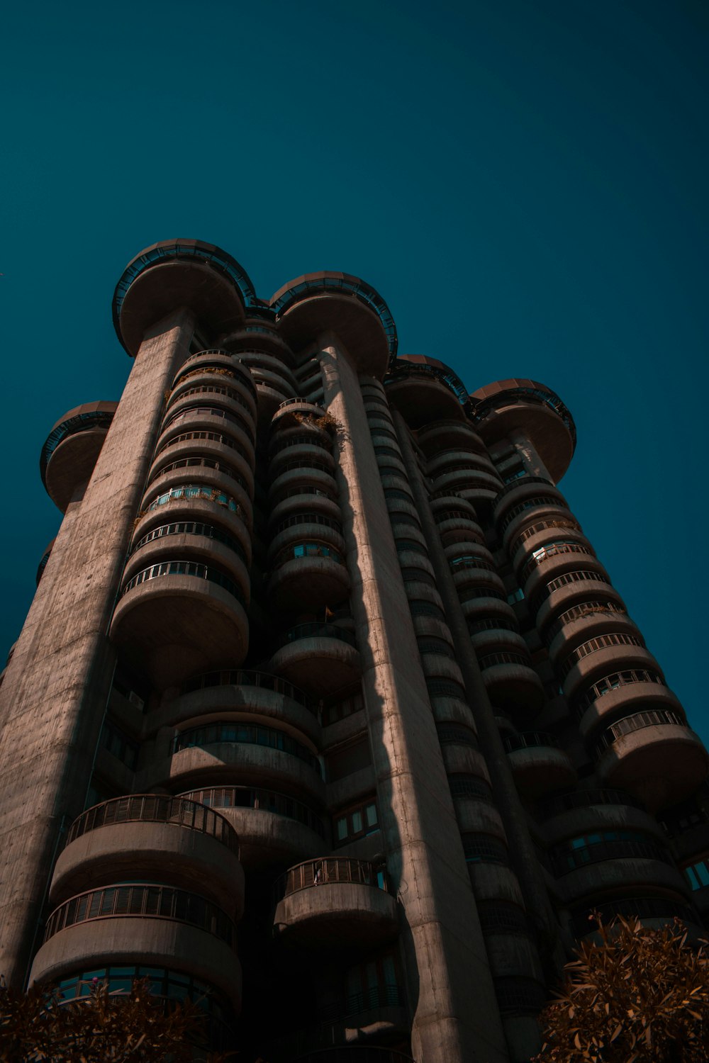 brown concrete building under blue sky during daytime