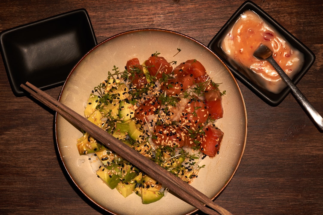 brown chopsticks on white ceramic plate