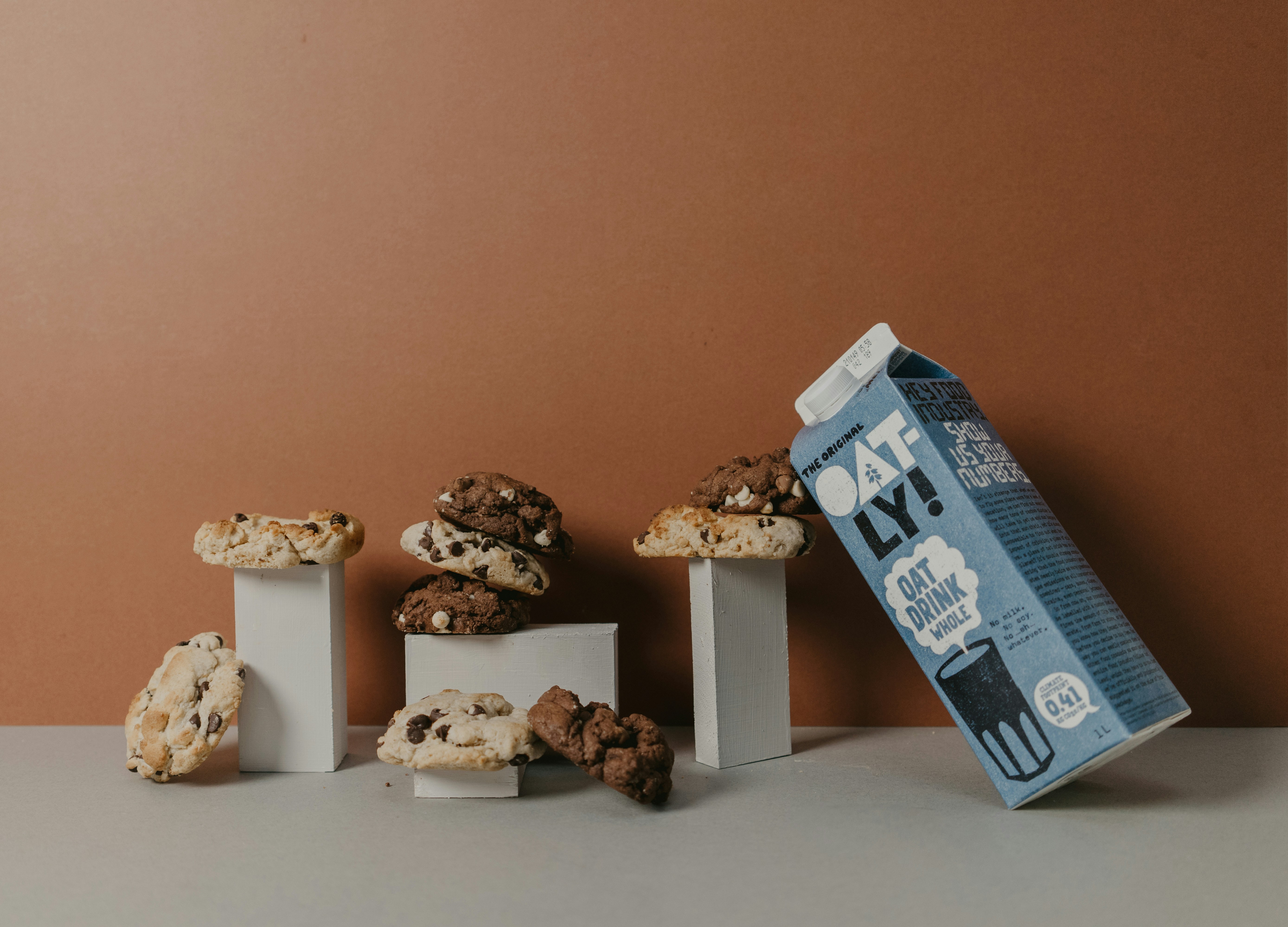 Flat lay of Milk-Bone MaroSnacks treats with bone toys, calcium powder, and a dog bowl