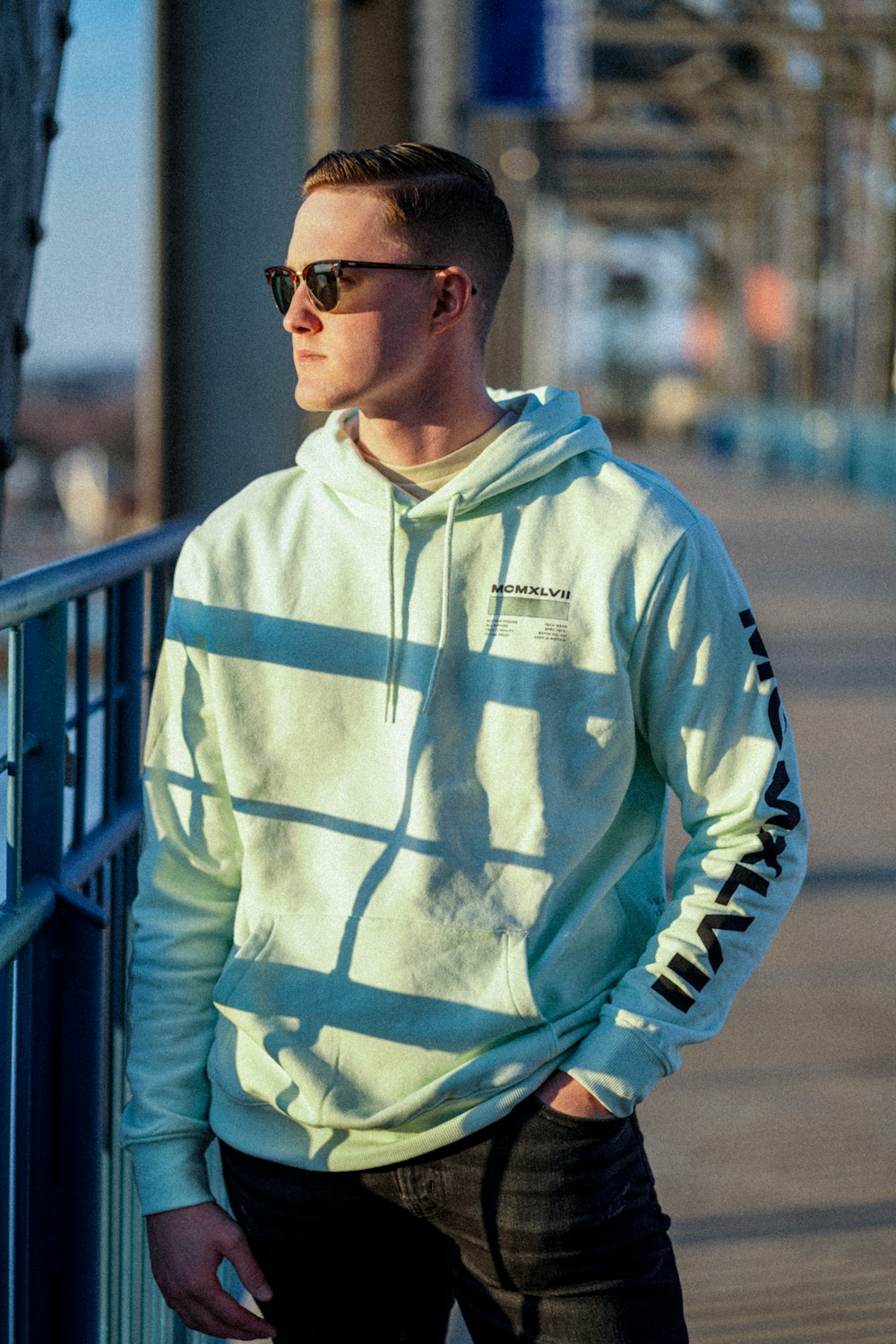 Man in blue and white adidas hoodie wearing black sunglasses photo – Free  Apparel Image on Unsplash