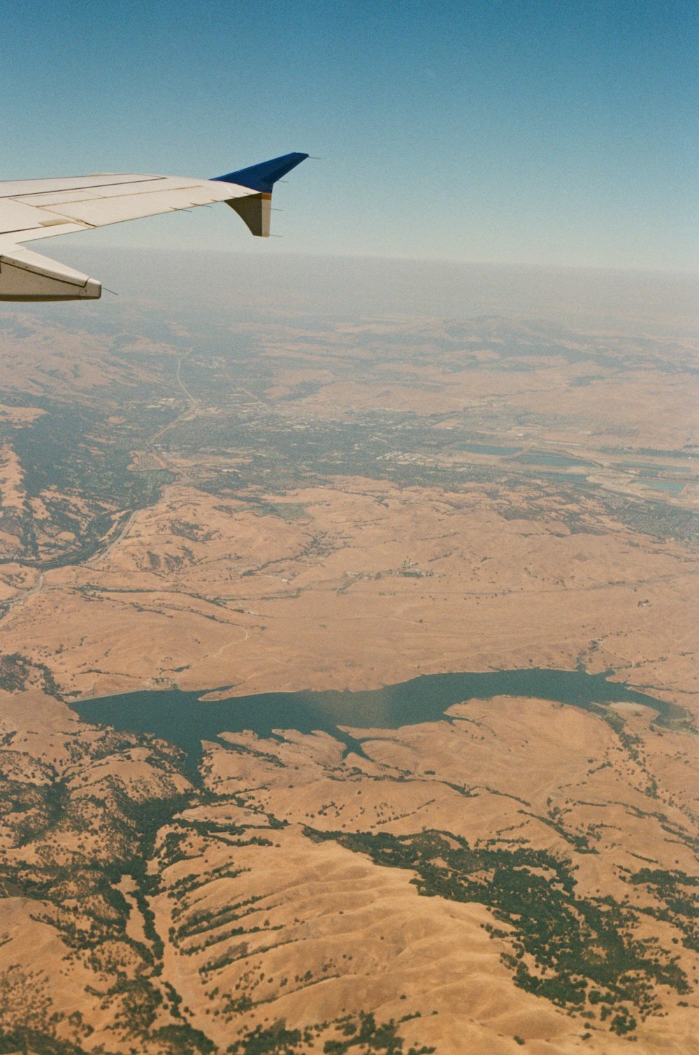 aerial view of brown field during daytime