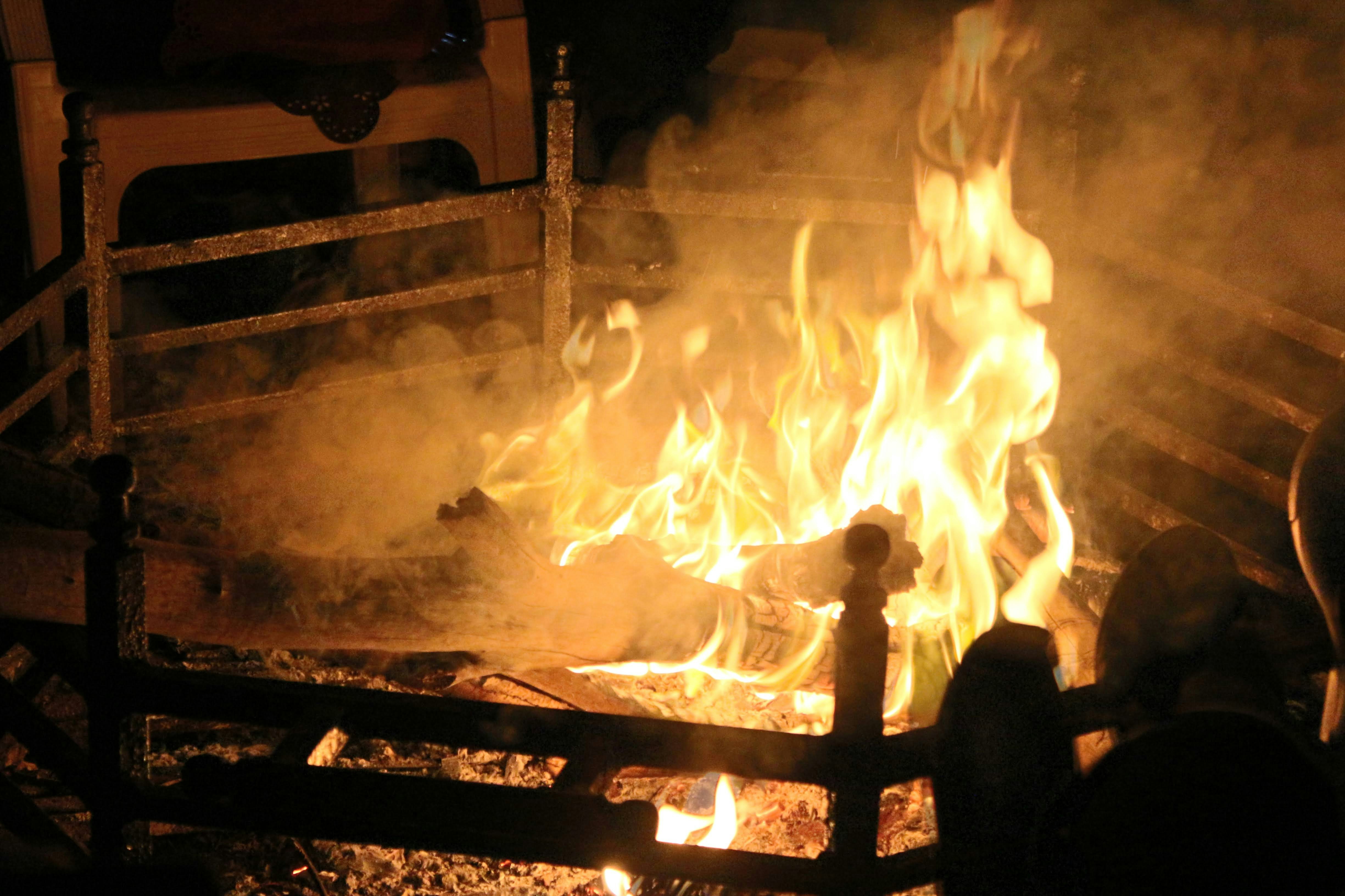 fire on fire pit during night time