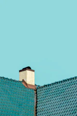 Modern tiled roof with clean, well-maintained pastilhas reflecting sunlight