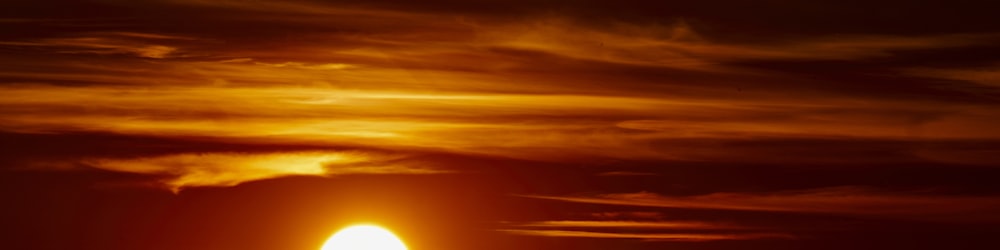 silhouette of clouds during sunset