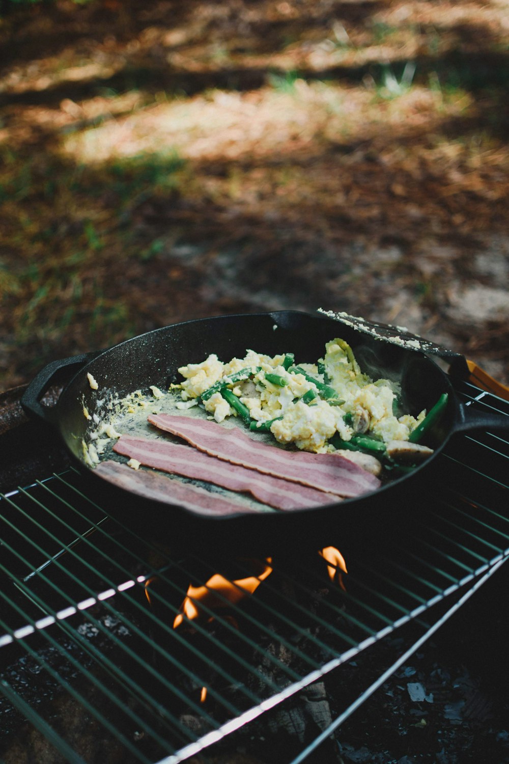 green vegetable on black frying pan