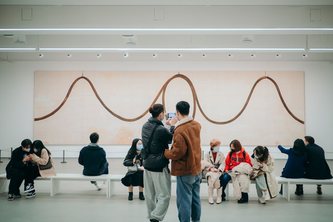 people standing on white floor