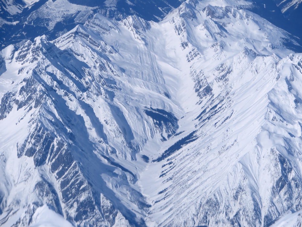 snow covered mountain during daytime