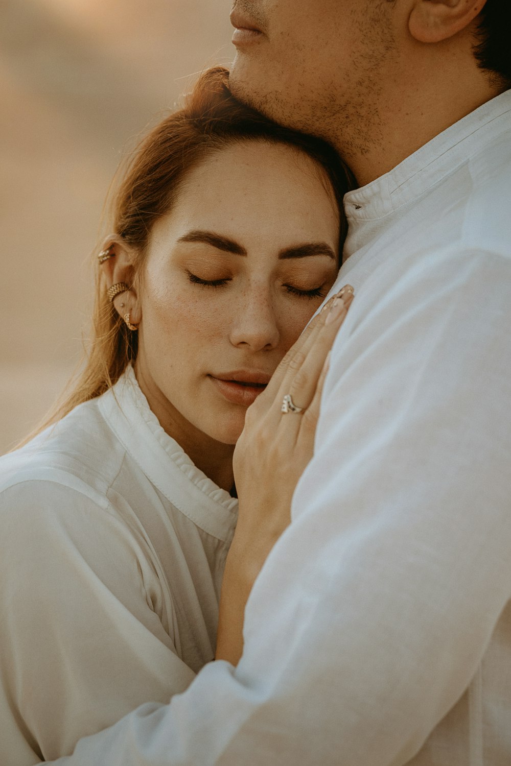 woman in white shirt smiling