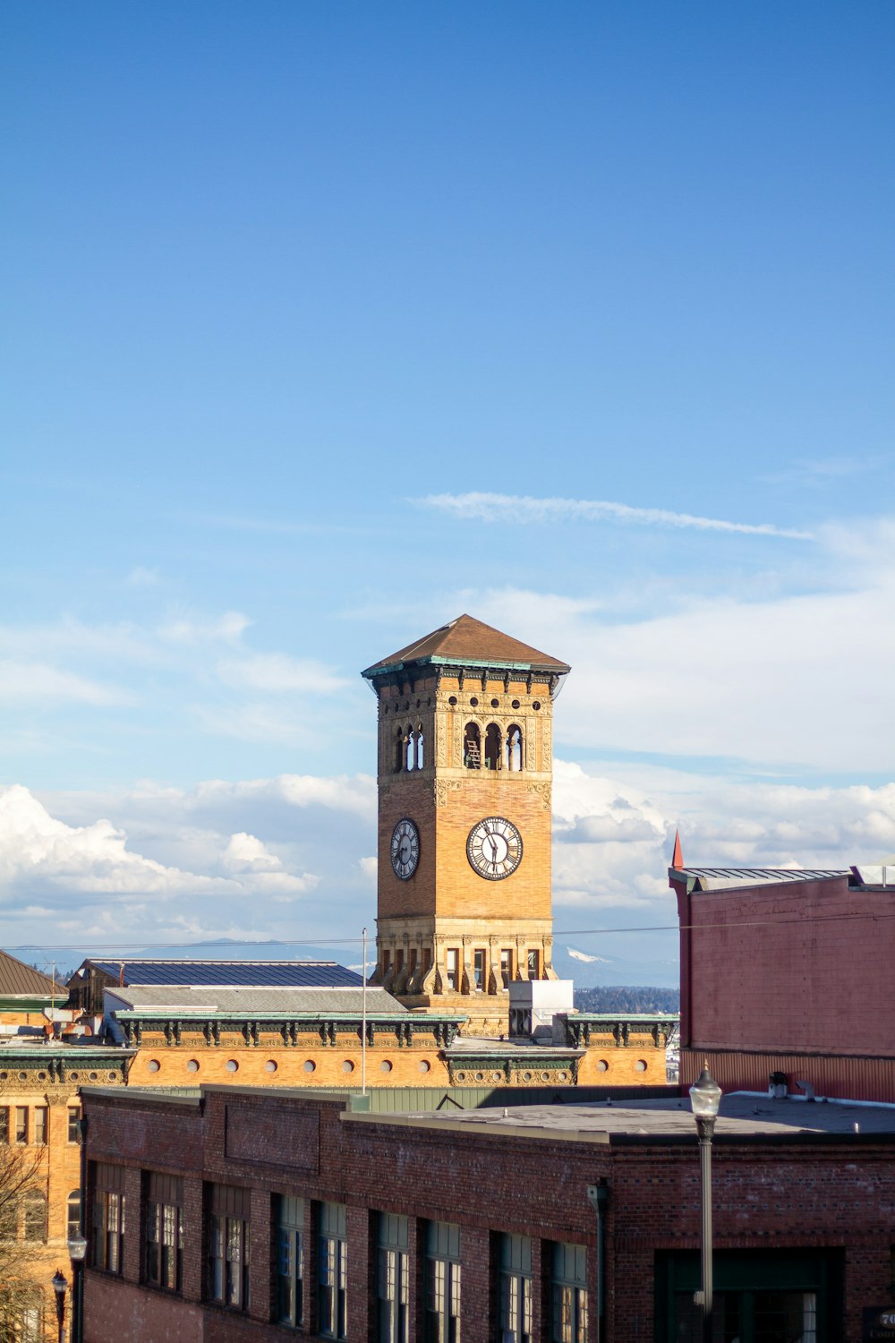 brown concrete building under blue sky during daytime