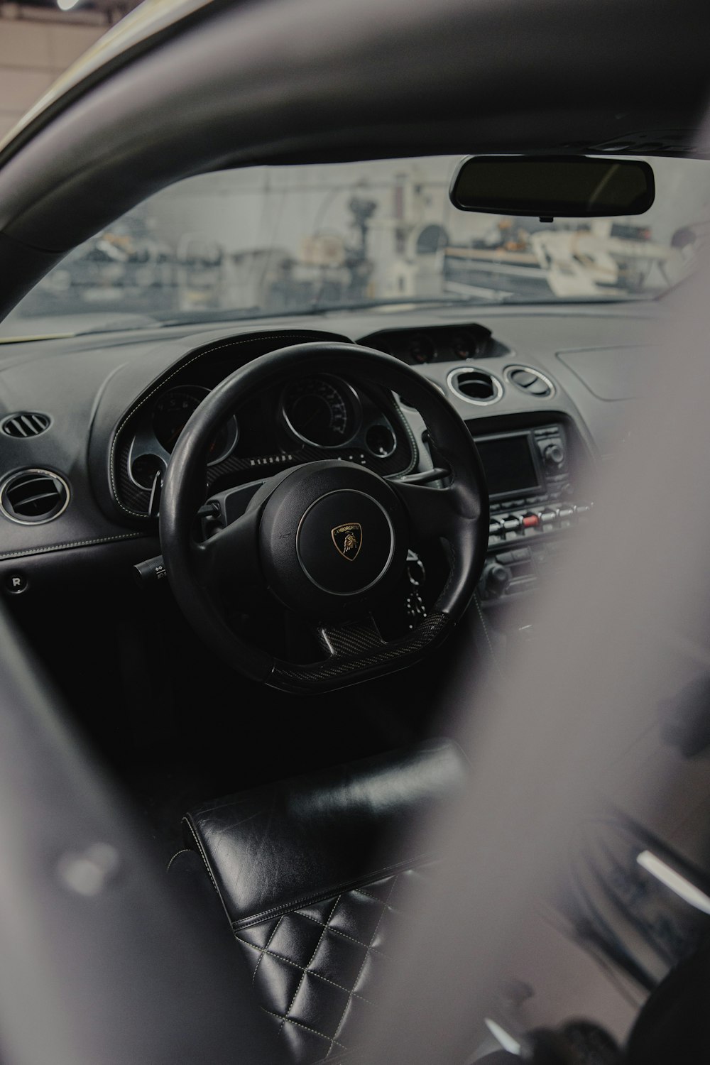 black and silver steering wheel