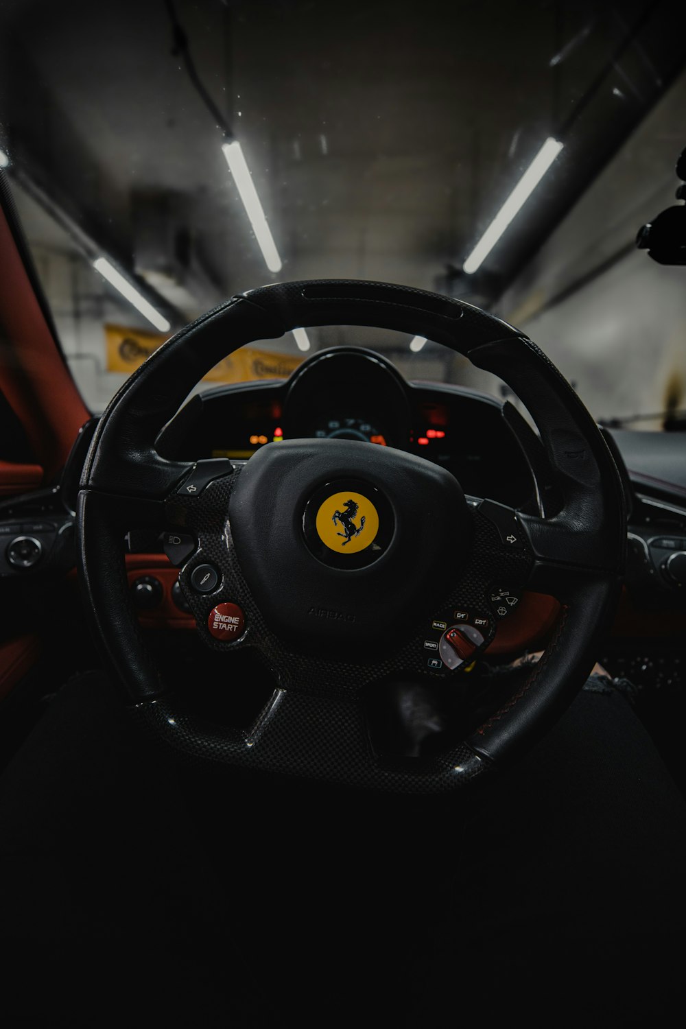 black steering wheel in close up photography