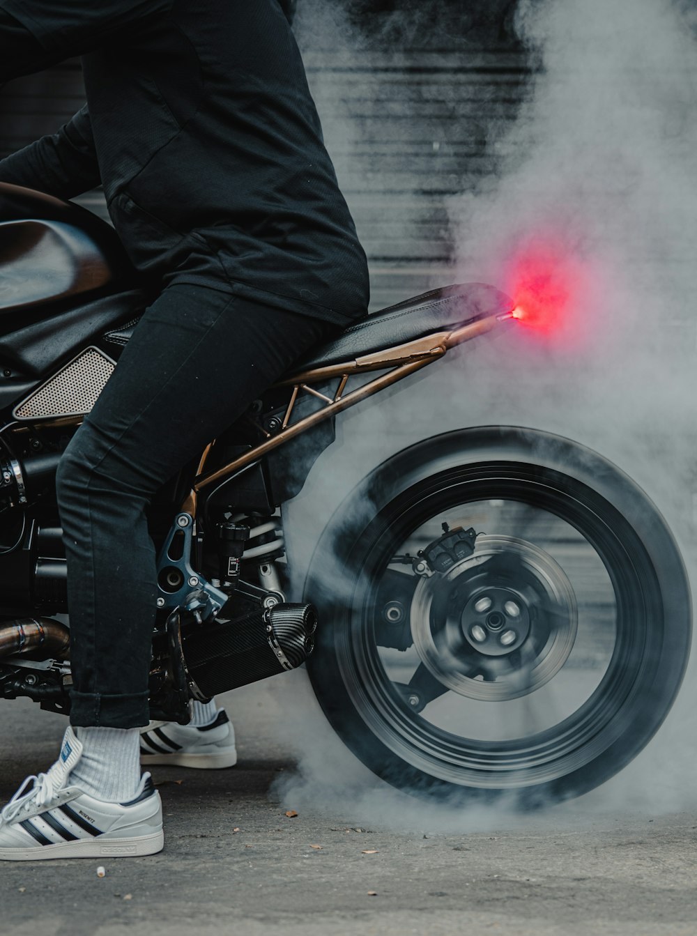 man in black jacket riding black motorcycle